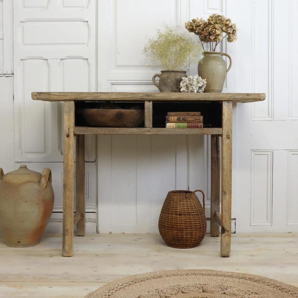 Rustic Elm console table with 2 cubie hole compartments, styled with rustic vases and dried flowers