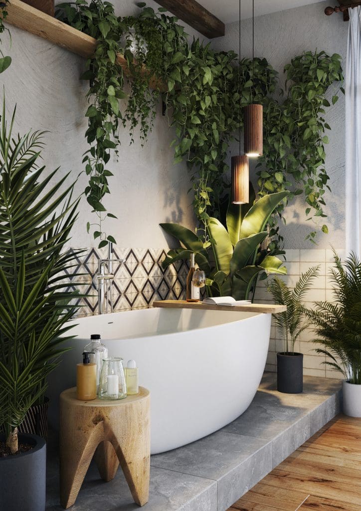 White modern free-standing bath with wooden shelve detailing styles with lots of plants hanging, on the shelf and next to the bath in black, grey and off-white pots