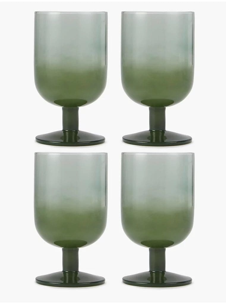 Dark green goblet glasses with short stem bottom