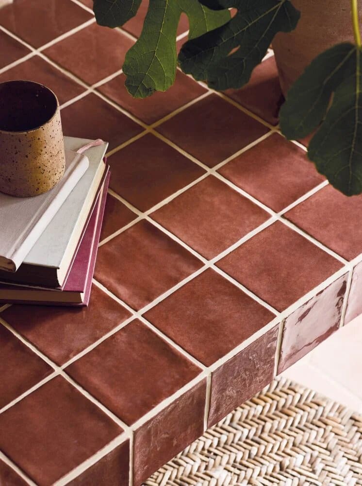 Dark red terracotta glazed small square tiles