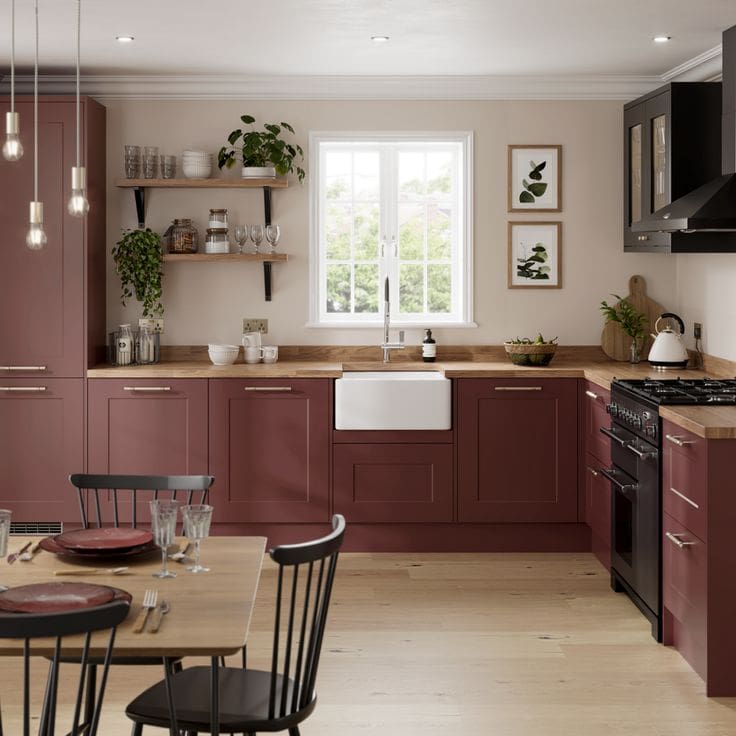 Red terracotta lower kitchen cabinets with wooden worktops, open wooden shelving and greenery for life and movement