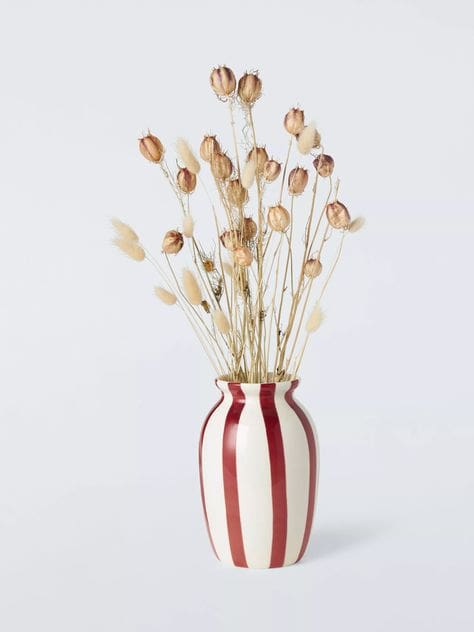 Hand painted red and white stripe vase with dried flowers