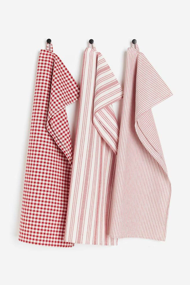 Red and white patterned tea towels